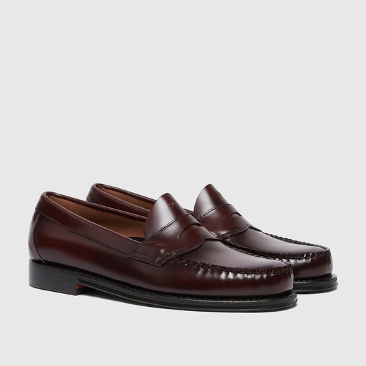 Bass Men's Weejun Logan Penny Loafer in shiny wine-colored leather, featuring a moc toe and penny slot.