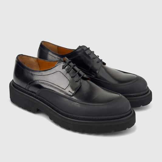 Men's Formales black leather chunky sole lace-up shoe, side view. Features a polished upper and a thick, textured lug sole.