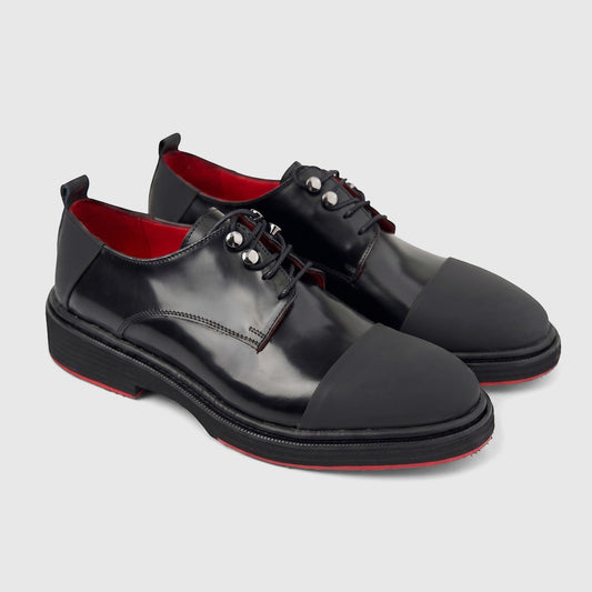 Formales Men's black leather lace-up shoes with a chunky sole, featuring red trim, captured in a clear side profile.