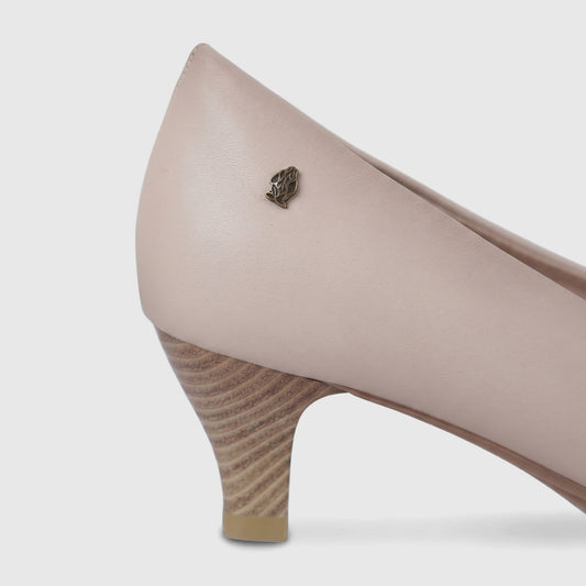 Hush Puppies Soft Style Aradia ladies comfort court shoe in nude, smooth finish, mid heel pump side view.