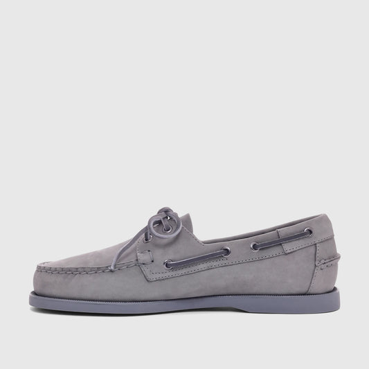 Men's Sebago Docksides Portland boat shoe in total mid-grey nubuck leather, viewed from the side with intricate lacing