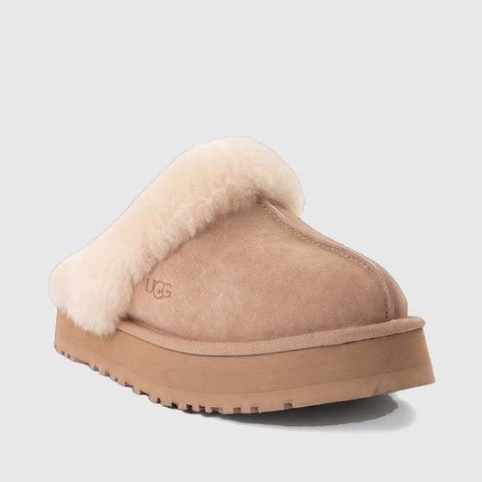 Ugg Ladies Clog Disquette 1122550 in sand suede with cream shearling collar and platform sole, side view