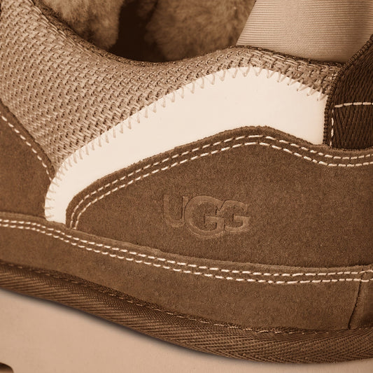 Ugg Ladies Sneaker Lowmel 1144032 in light bronze, side view suede and mesh low-top with thick sole.