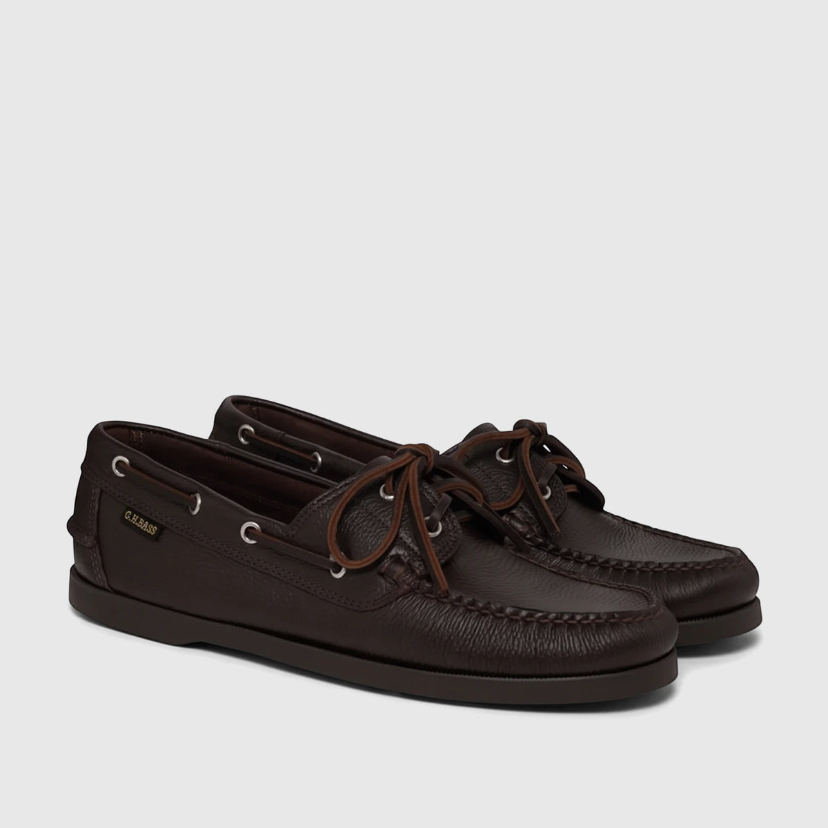 Bass Men's Boat Shoe Jetty II Boater 2 Eye in dark brown textured leather, featuring brown laces and silver eyelets, side