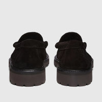 Rear view of two black suede Bass Men's Weejun Lug Larson chunky sole loafers, showing textured soles.