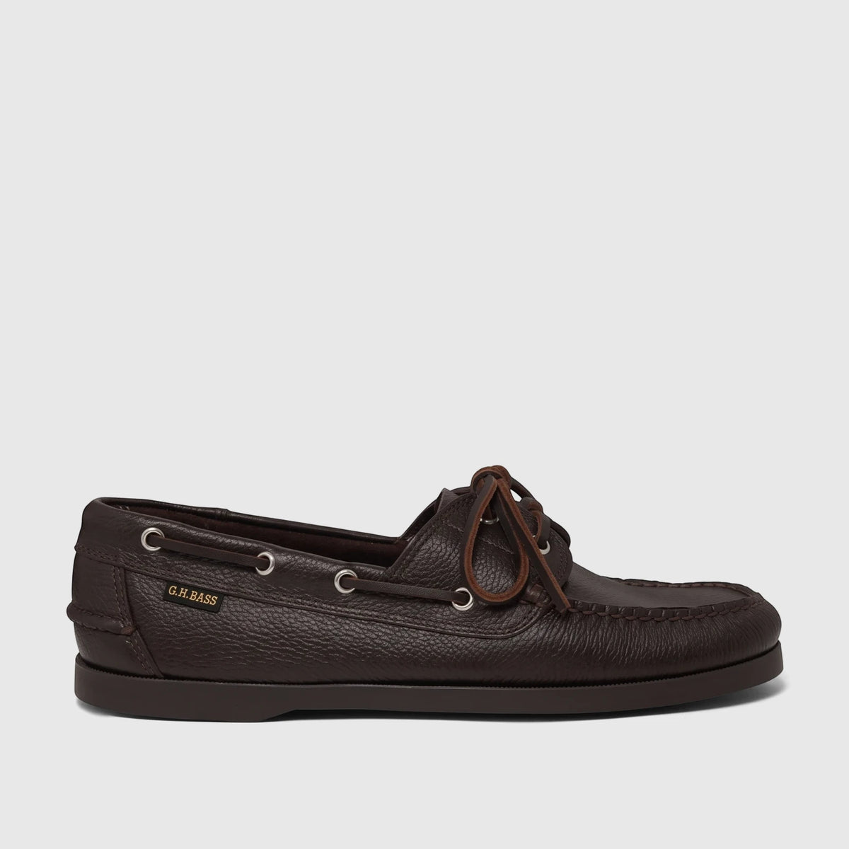 Men's dark brown textured leather G.H. Bass boat shoe with brown laces and silver eyelets, shown from a side view.