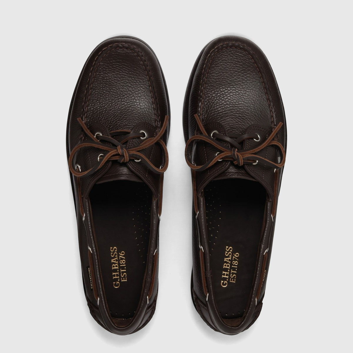 Top-down view of Bass Men's Jetty II Boater 2 Eye boat shoes in dark brown pebbled leather with brown laces.