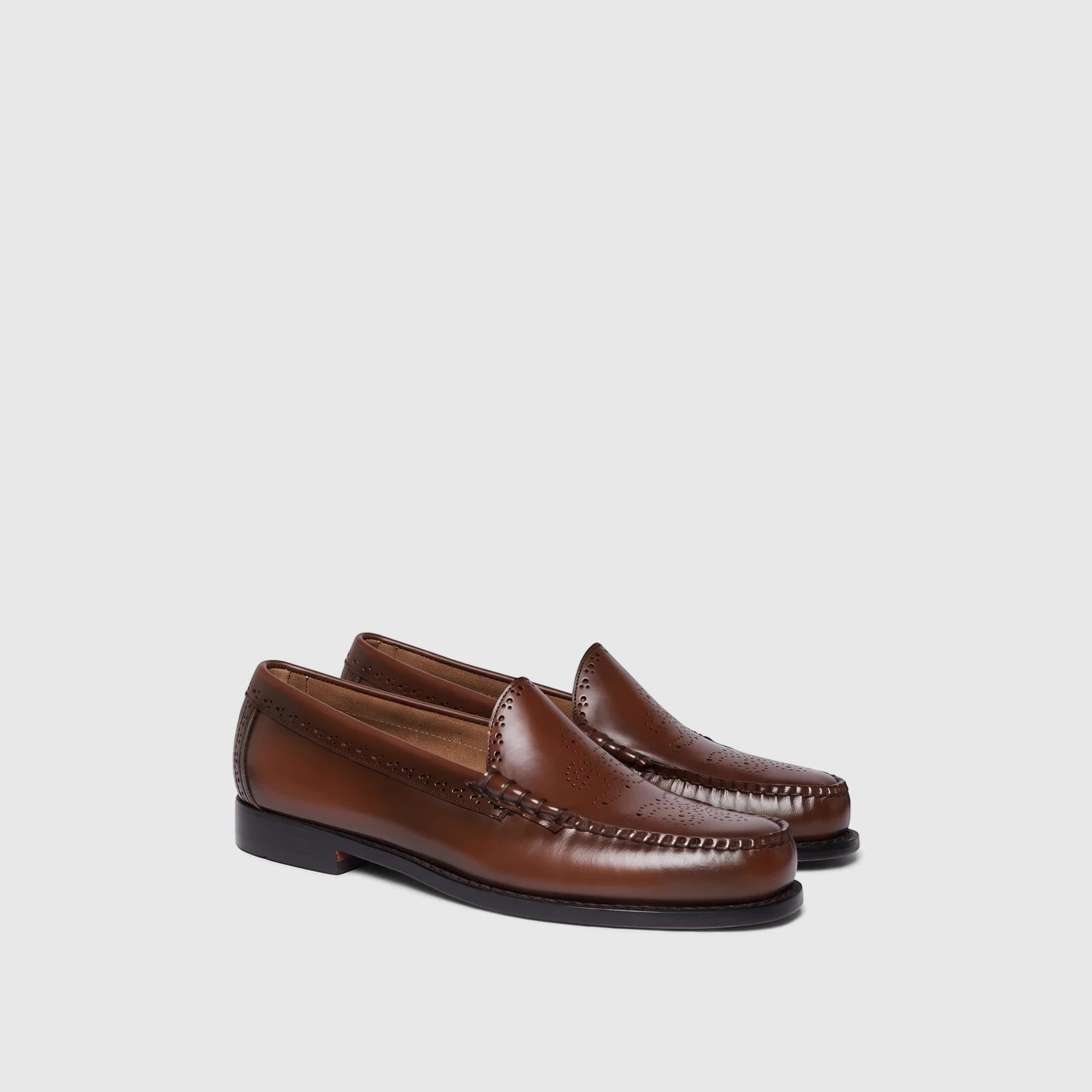 Pair of Bass Men's Weejun Venetian Brogue loafers in rich brown leather with perforated details, viewed side-by-side.