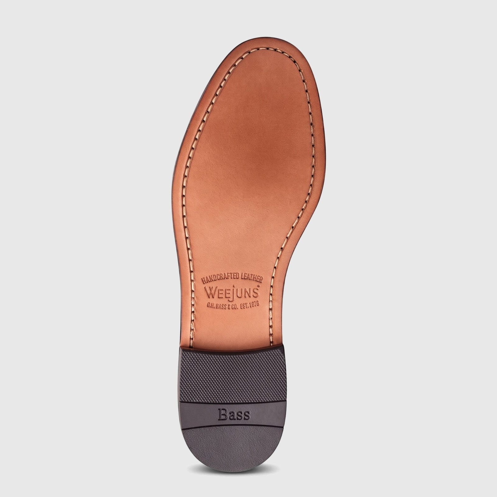 Bass Men's Weejuns Venetian loafer sole in dark brown suede, showcasing handcrafted leather and rubber heel with branding.