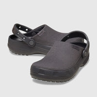 A pair of black Crocs Classic Crafted Clogs with a distinctive fabric-like texture, shown on a white background.