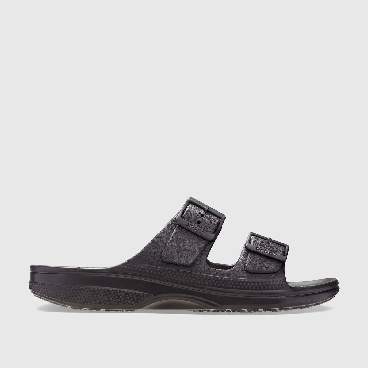 Black Crocs Saturday Sandal with two adjustable straps and buckles, made from molded material, shown in a side profile view.