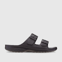 Black Crocs Saturday Sandal with two adjustable straps and buckles, made from molded material, shown in a side profile view.