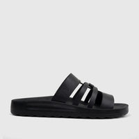 Black ladies' casual sandal with multiple straps and a textured sole, presented in a side profile view.