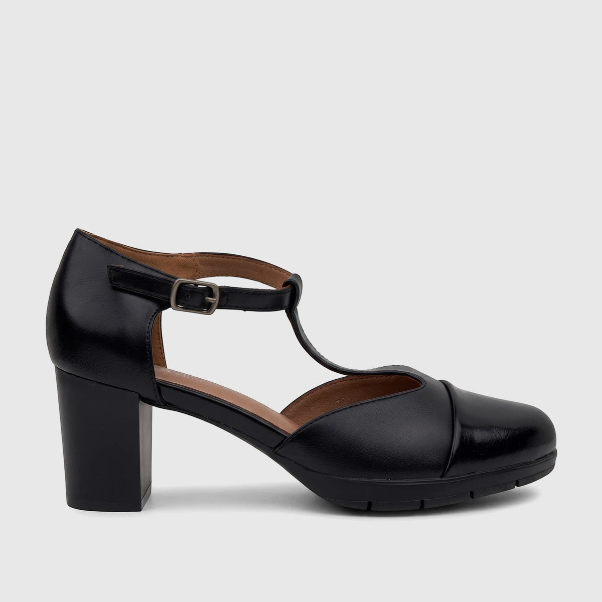 Black synthetic leather ladies' dress shoe with a block heel, T-bar strap, and buckle closure, shot in profile.