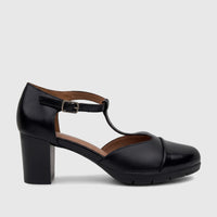 Black synthetic leather ladies' dress shoe with a block heel, T-bar strap, and buckle closure, shot in profile.