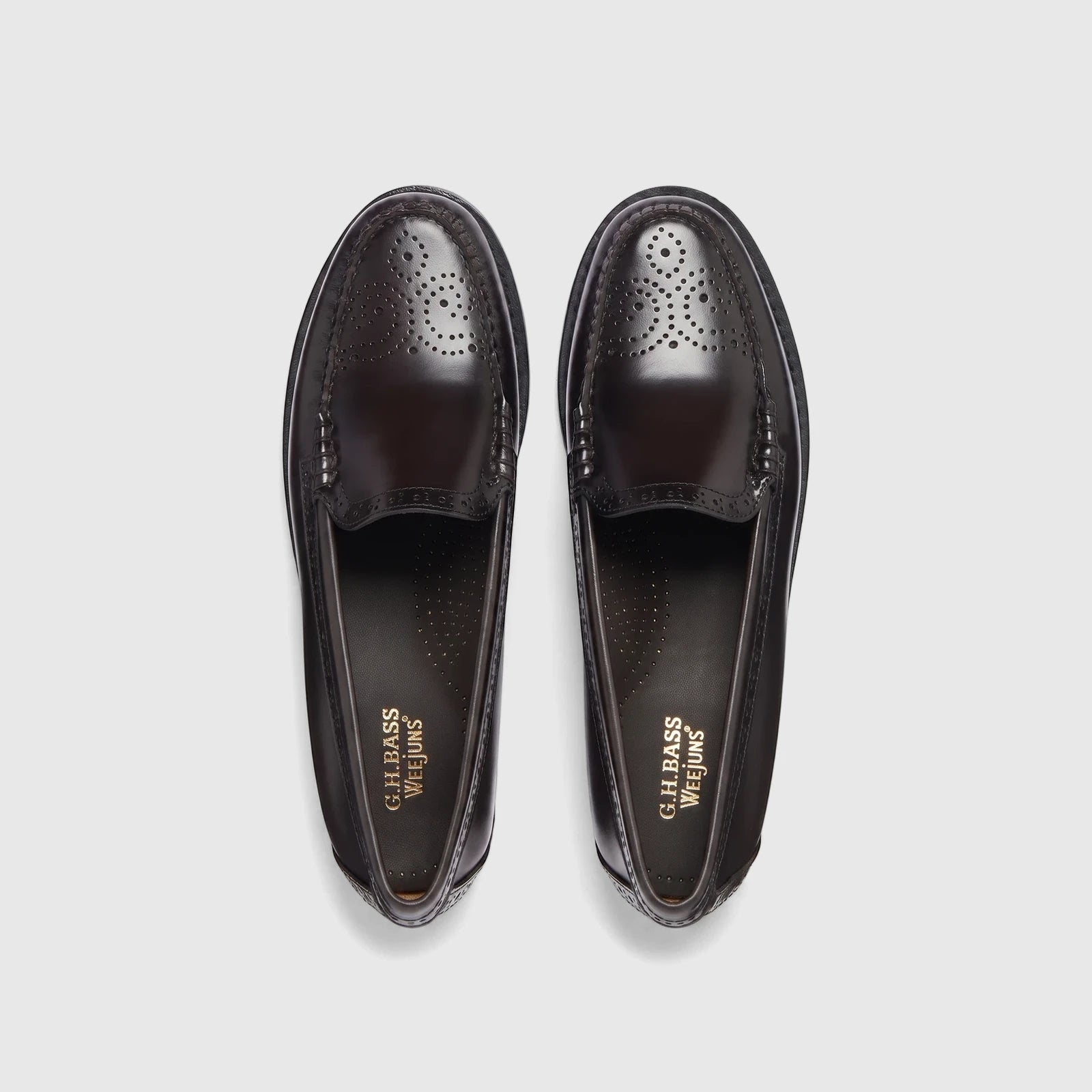 A pair of black leather Bass Men's Loafer Weejun Venetian Brogue shoes, visible from a top-down perspective.