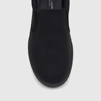 Close-up top view of a black PC Ladies Casual Slip On Sneaker with an elastic gore, on a white background.