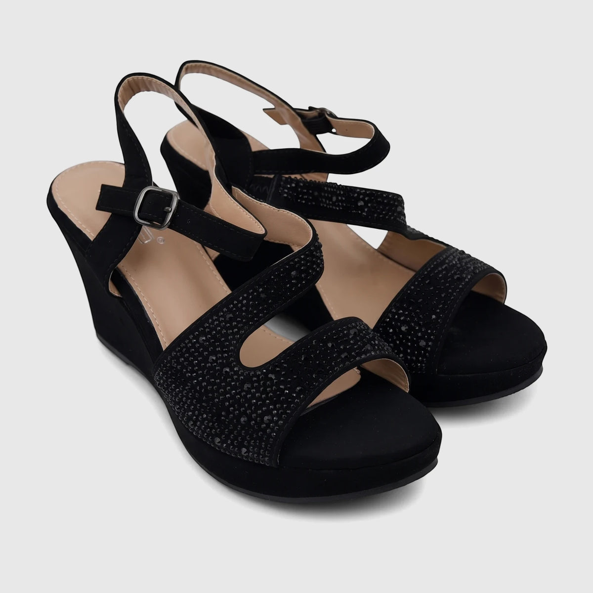 Pair of black embellished women's evening wedge sandals with ankle straps and buckles, viewed from a slightly elevated angle.