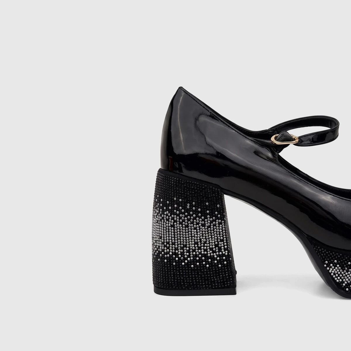 Bulbul Ladies Block Heel Mary Jane shoe in black patent leather, featuring a sparkling rhinestone-encrusted heel and strap