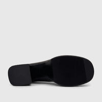 Bulbul Ladies Block Heel Mary Jane shoe in black, showing the textured sole and chunky block heel from below.