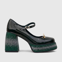 Dark green patent leather ladies' Mary Jane shoe with a thick block heel and platform adorned with green and silver bling.