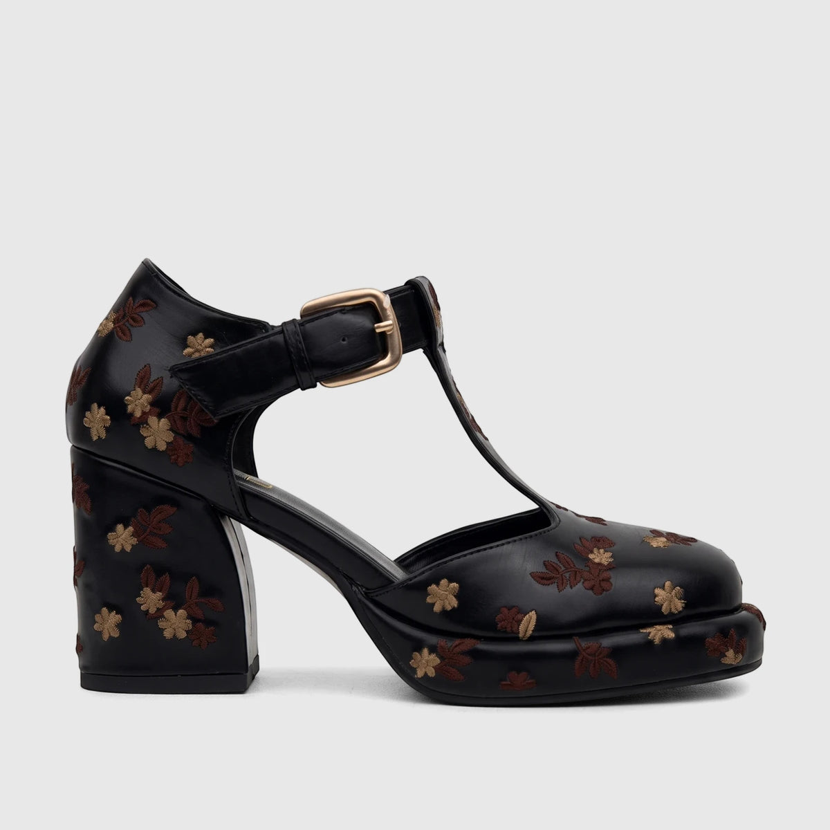 Black ladies' Bulbul block heel shoe with a T-bar strap, gold buckle, and intricate floral embroidery.