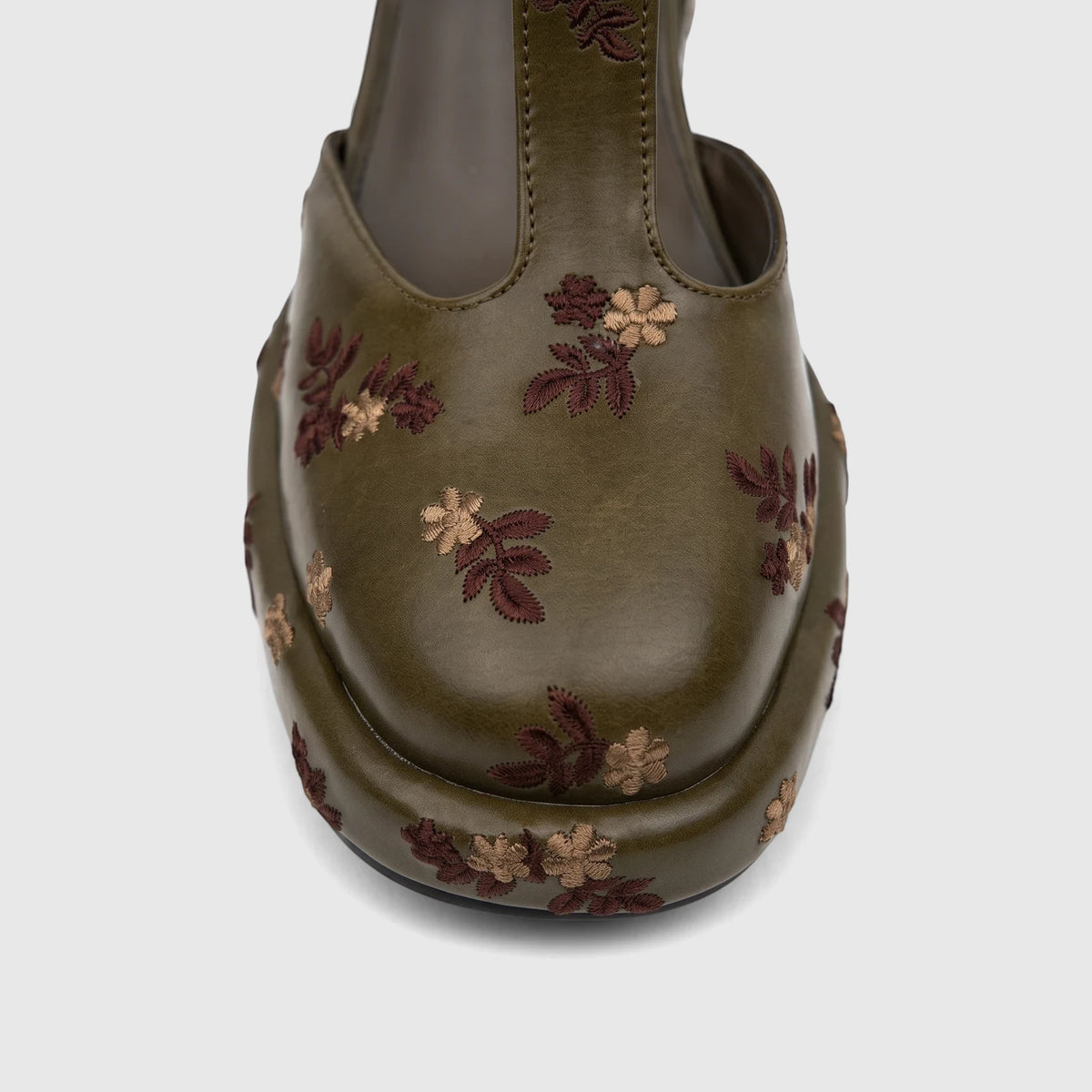 Bulbul Ladies Block Heel With T Bar Khaki shoe, featuring floral embroidery and a platform sole, front view.