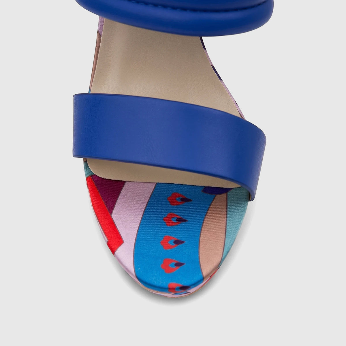 Close-up of a Bulbul Ladies Casual Block Heel Mule in blue with a vibrant multi-colored patterned toe and blue strap.