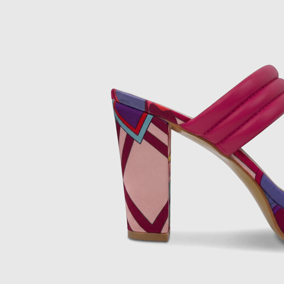 Bulbul Ladies Casual Block Heel Mule in vibrant fuchsia with a distinctive patterned heel and padded straps, shown in a side