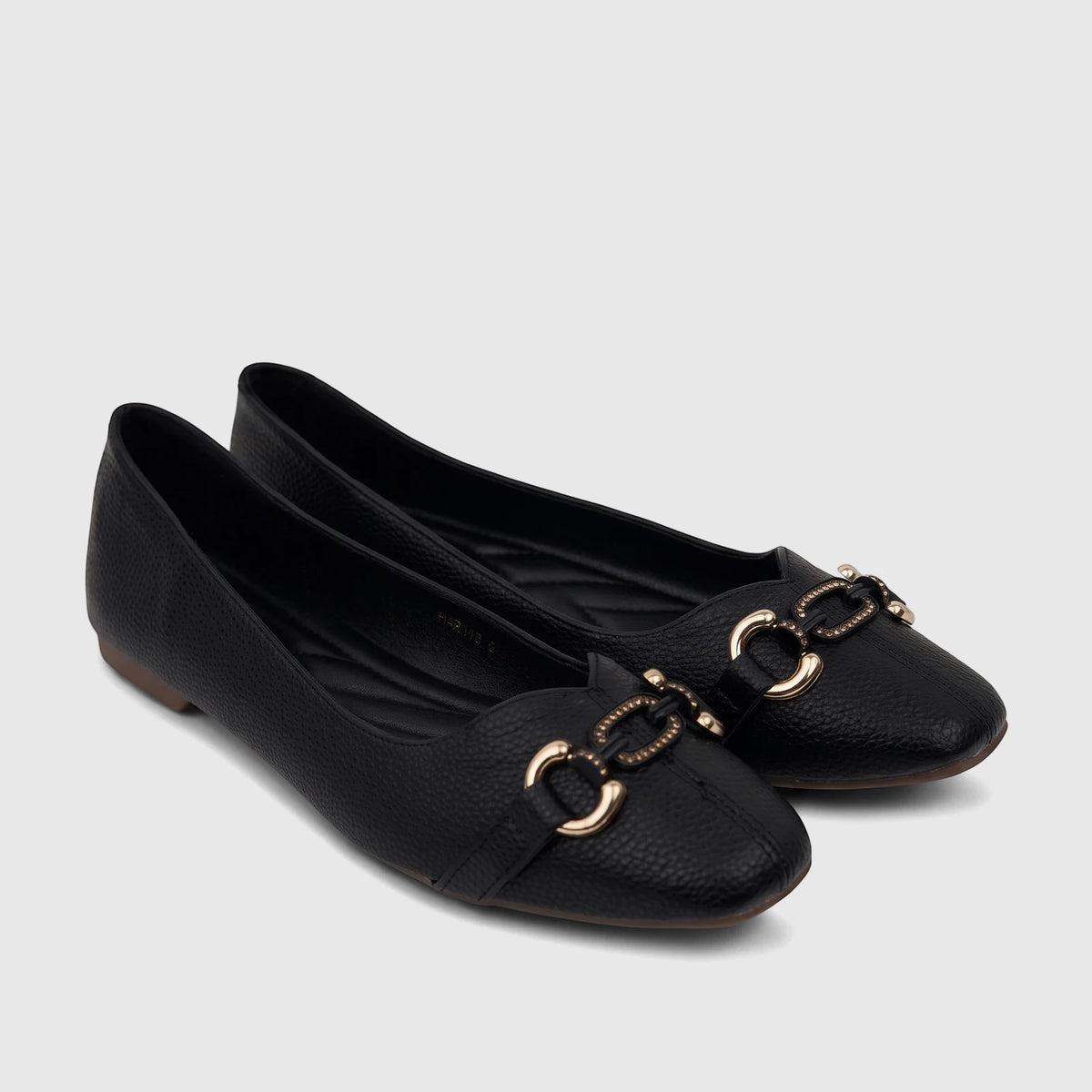 A pair of black Bulbul ladies' casual pumps, featuring a textured faux leather upper and decorative gold-tone chain hardware