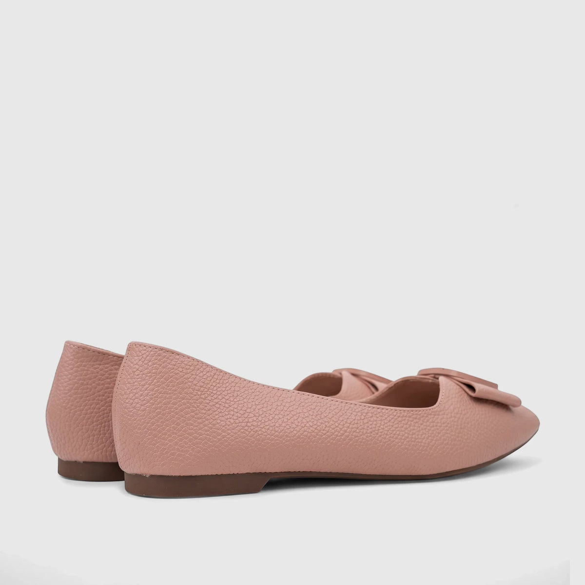 Pair of Bulbul Ladies Casual Pump Pink HAR118 ballet flats, crafted from pebbled faux leather, viewed from the side with