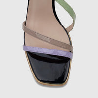 Close-up of Bulbul Ladies Casual Slingback Sandal with light purple, taupe, and light green straps, glossy black square toe,
