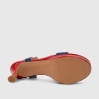 Red and blue Bulbul Ladies Casual Slingback Sandal in patent leather, viewed from the underside, showcasing the sole and