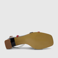 Bottom view of a Bulbul Ladies Casual Slingback Sandal Red Multi HAR113, showcasing the textured brown sole and block heel