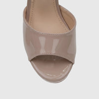 Close-up front view of a Bulbul Ladies Dress Block Heel Sandal in beige patent finish, showcasing the toe and strap.