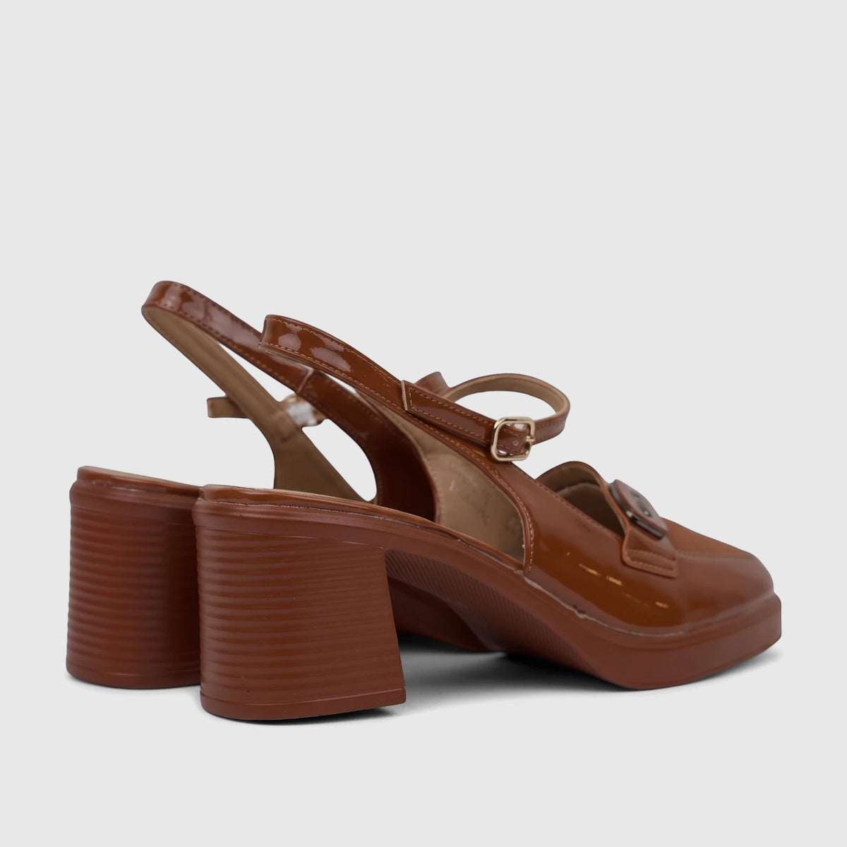 Camel brown patent leather women's dress block heel sandals with ankle straps and a square toe, displayed from a side angle.