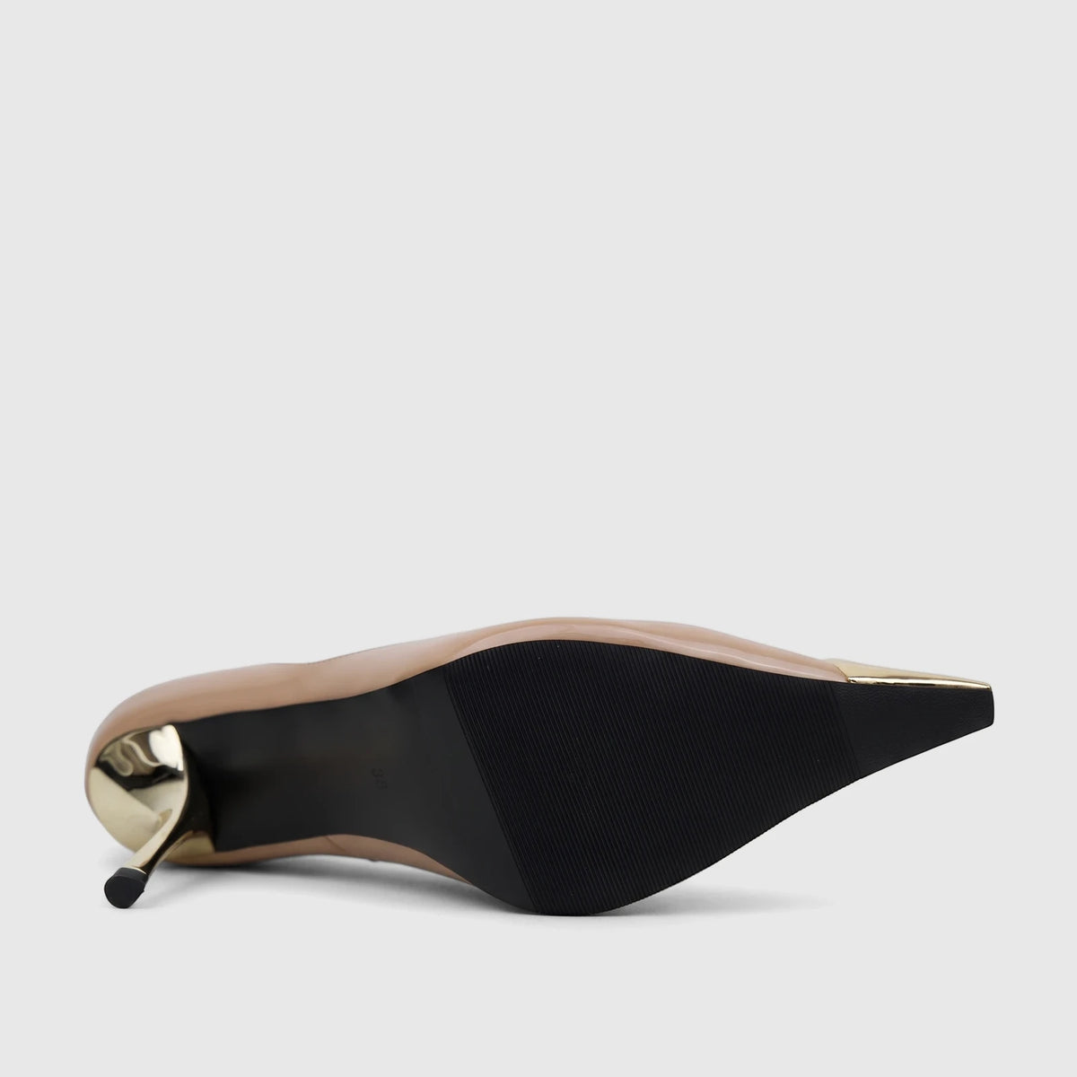 Beige patent leather Bulbul ladies dress court high-heel pump shoe with gold stiletto heel and pointed toe, shown from the