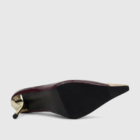 Bulbul Ladies Dress Court Purple high-heel shoe, patent leather, glossy burgundy finish, gold-tone heel, underside view.