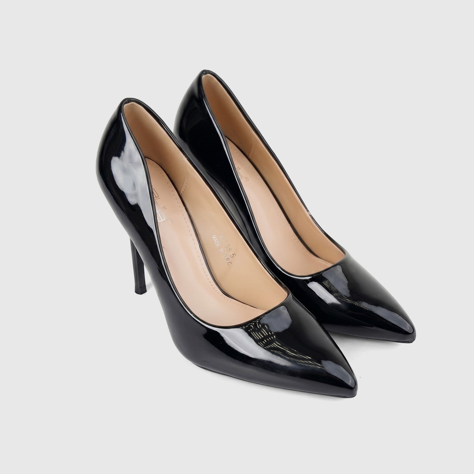 A pair of black patent leather Bulbul Ladies Dress Court Shoes, featuring a pointed toe and stiletto heel, displayed on a
