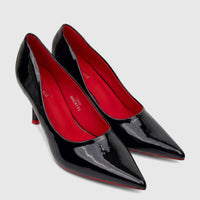Bulbul Ladies Dress Court Shoes in black patent leather, featuring pointed toes and contrasting red soles, displayed from an