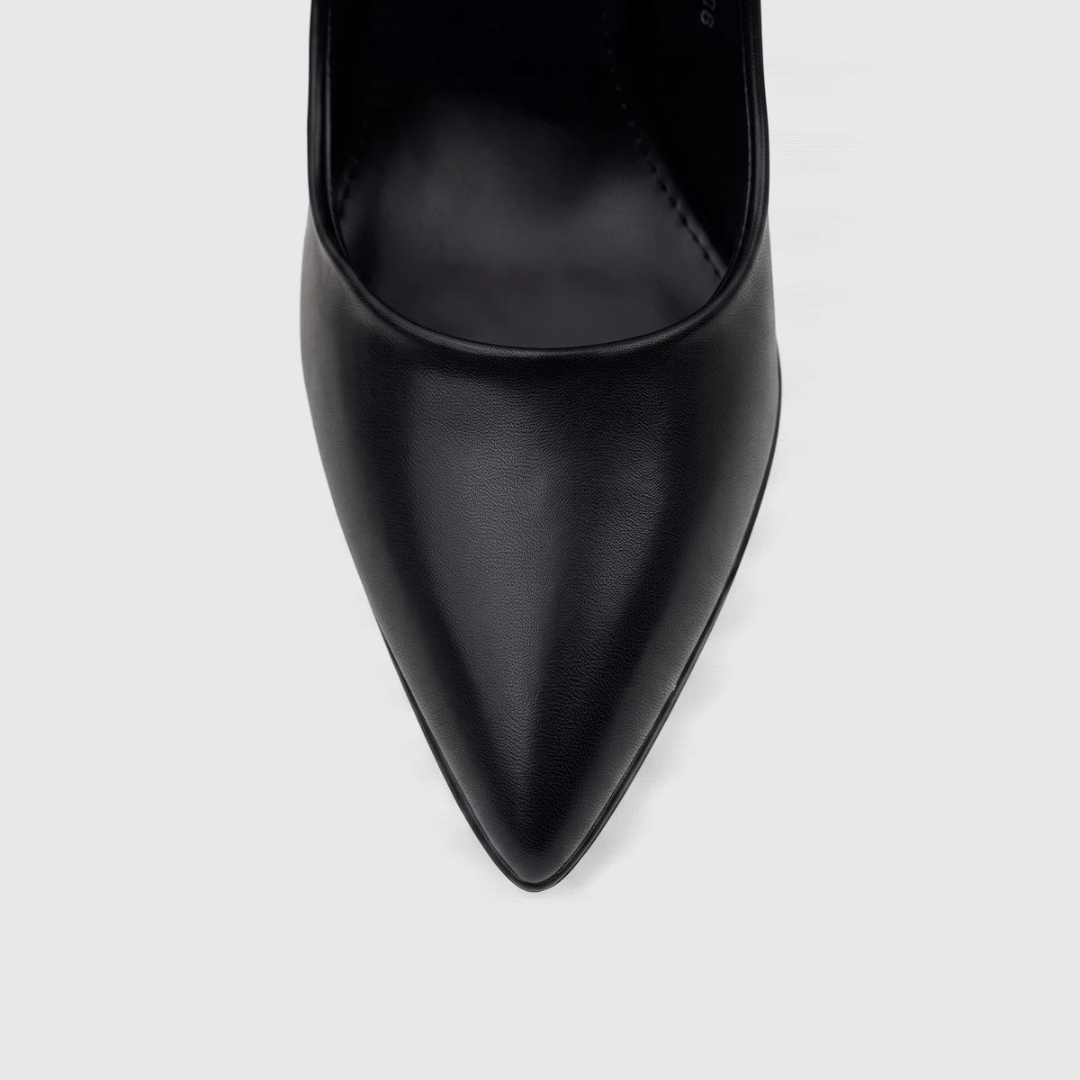 Close-up of a single Bulbul Ladies Dress Court Shoe in black leather, featuring a stylish pointed toe.
