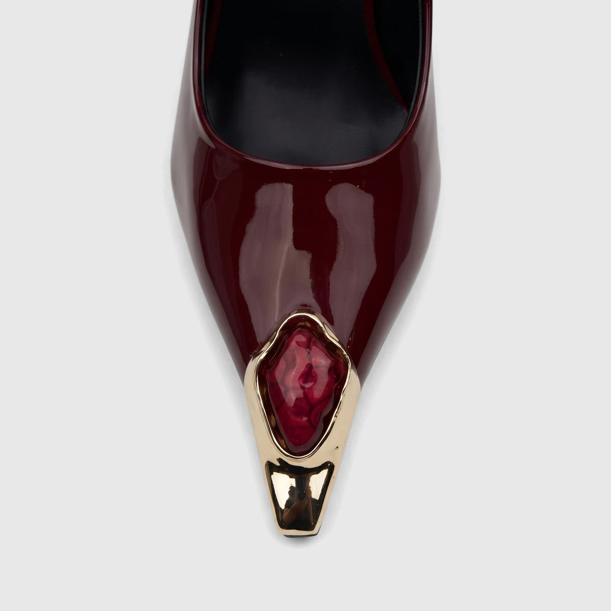 Bulbul Ladies Dress Court Shoe in glossy burgundy patent leather, featuring a pointed toe with a gold-tone and red jeweled