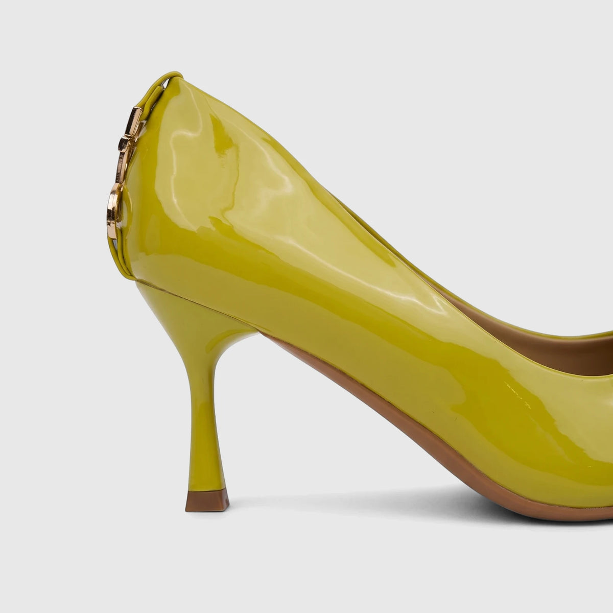 Close-up side view of a shiny lime green patent leather Bulbul Ladies Dress Court Shoe with a high heel and a subtle gold