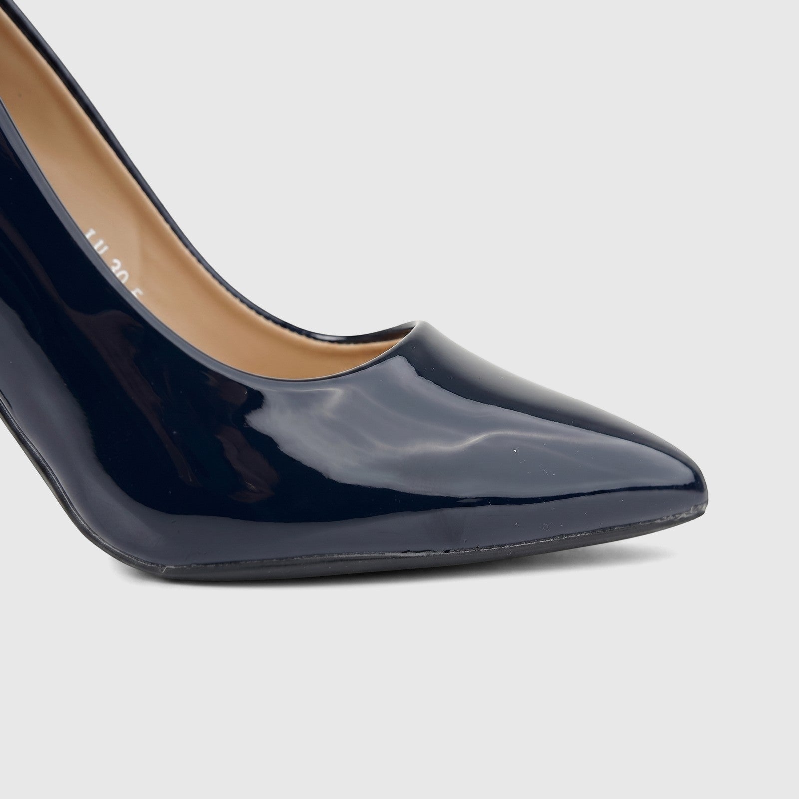 Close-up of a stylish Bulbul Ladies Dress Court Shoe LU030 in navy patent leather, featuring a high heel and pointed toe