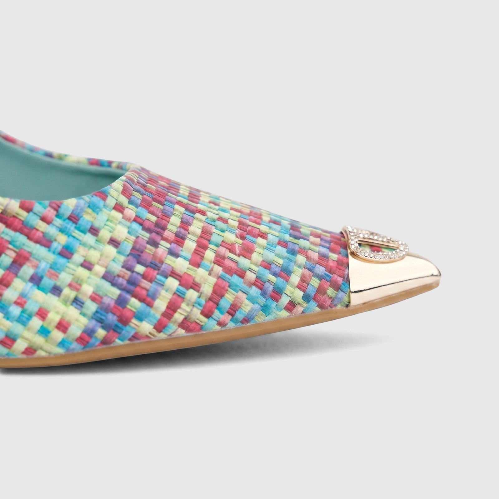 Close-up of a Bulbul Ladies Dress Court Shoe LU032 featuring a multi-colored woven texture, gold pointed toe cap, and