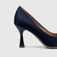 Navy Bulbul Ladies Dress Court Shoe with a unique flared heel and polished finish, presented from a side view.