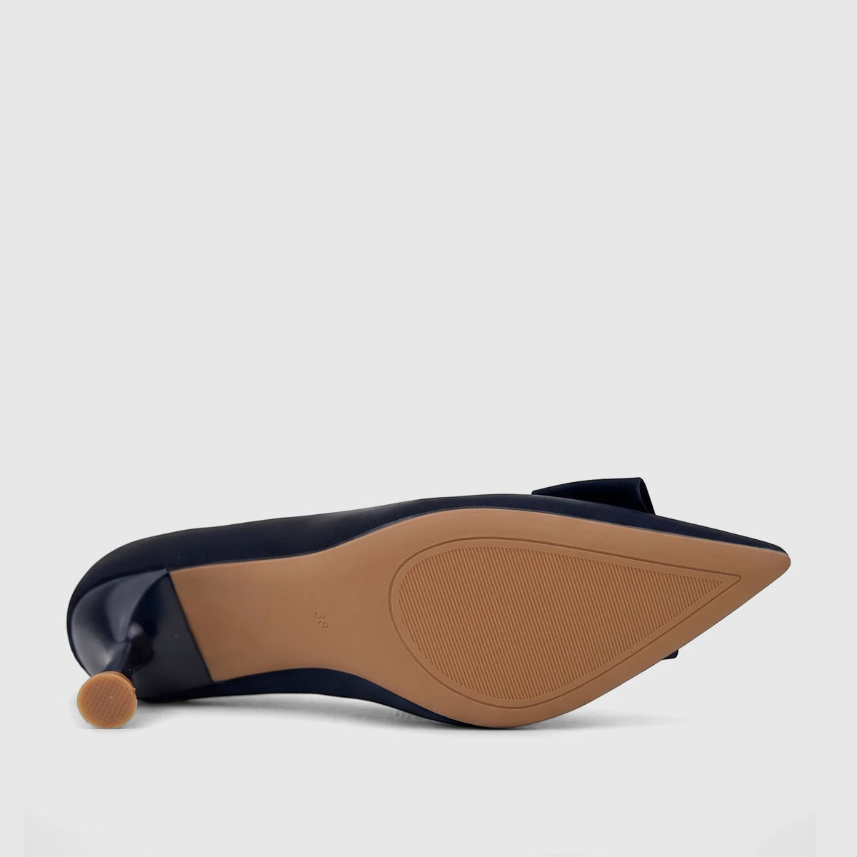 Underside view of a navy blue Bulbul Ladies Dress Court Shoe with a pointed toe and kitten heel, showing the light brown