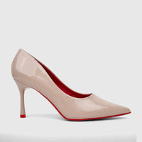 Bulbul Ladies Dress Court Shoe Nude LU044. A nude patent leather pointed-toe stiletto high heel shoe with a red sole and