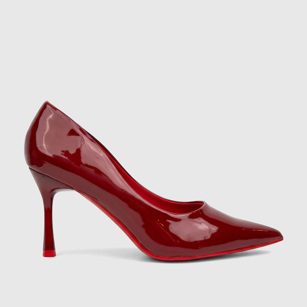 Bulbul Ladies Dress Court Shoe Red LU044, a glossy red patent leather high heel with a pointed toe, presented in a side