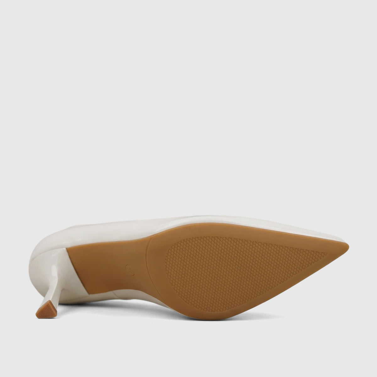 Cream Bulbul Ladies Dress Open Waist Court Shoe, featuring a pointed toe and high heel, viewed from the underside to show